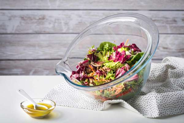 Pyrex bowl made of thick-walled borosilicate glass with wide spout & handle