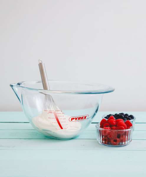 Pyrex bowl made of thick-walled borosilicate glass with wide spout & handle
